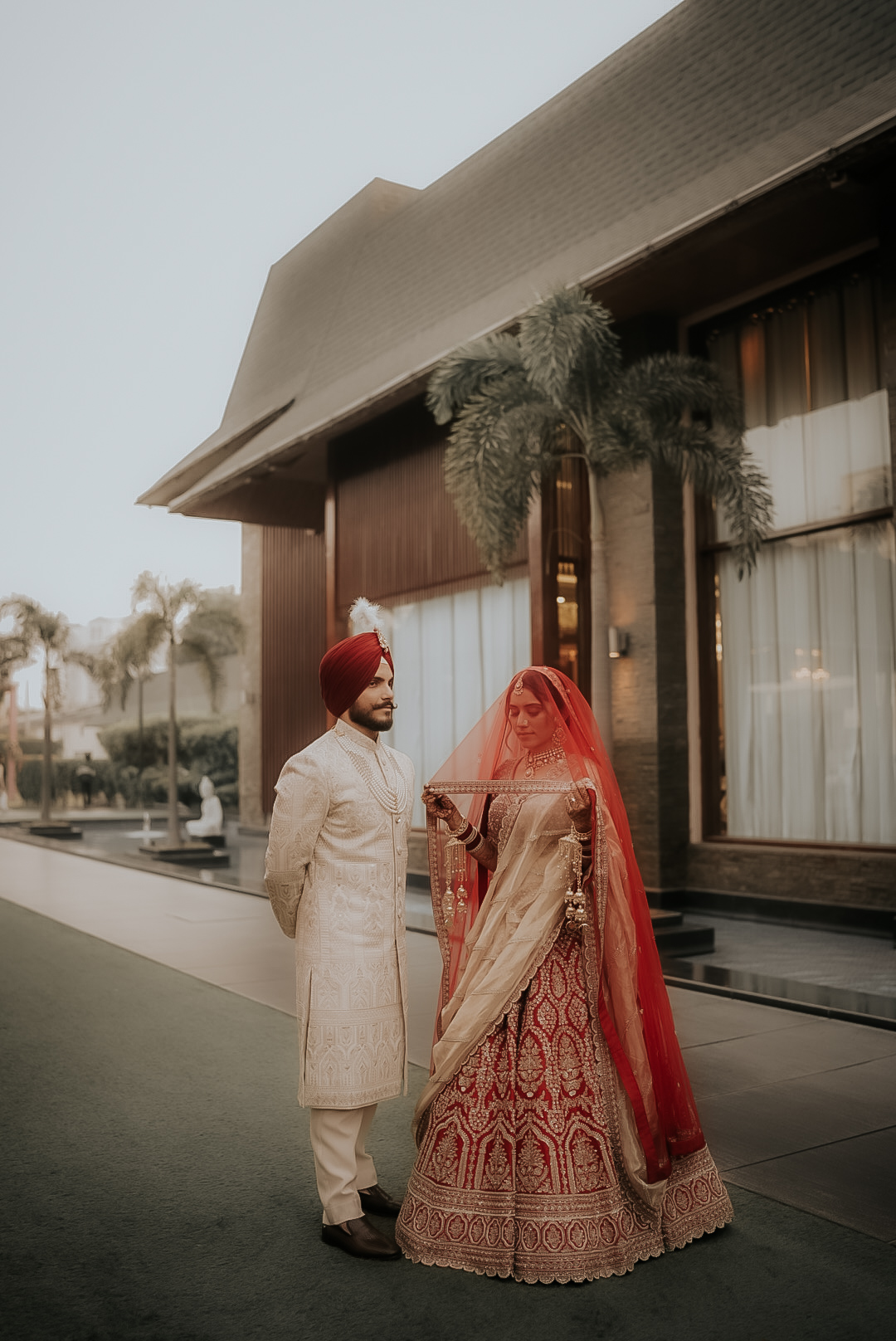 Wedding couple walking at golden hour